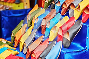 Colorful handmade leather slippers on a market in Marrakech, Morocco