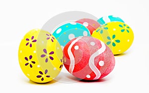 Colorful handmade painted easter eggs isolated on a white