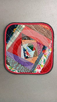 Colorful handmade textiles. Colored fabric patchwork background.