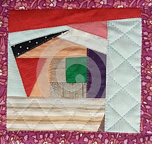 Colorful handmade textiles. Colored fabric patchwork background.