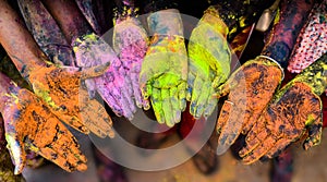 Colorful hands in Holi Festival