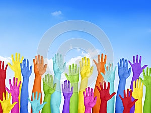 Colorful Hands Raised With Blue Sky