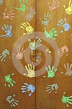 Colorful hands on wardrobe