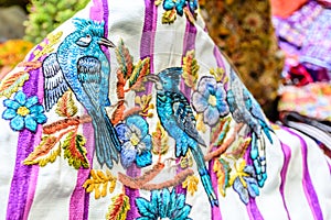 Colorful handwoven Guatemalan blouse called huipil