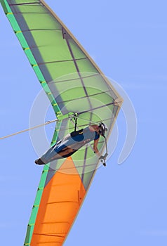 Colorful hangglider in the sky photo