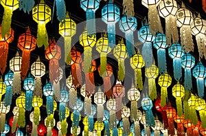 colorful hanging lanterns lighting on night sky in loy krathong festival