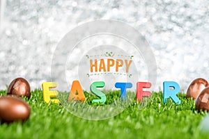 Colorful happy easter day and eggs on green grass field at outdo