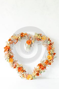 Colorful heart shaped flower arrangement photo