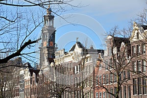 Colorful heritage buildings with gable rooftops, located along Keizersgracht canal in Amsterdam, Netherlands