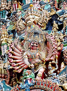 Colorful hindu statues on temple walls