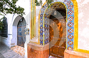 Colorful historic buildings in the center of the old city Barrio Antiguo at a peak tourist season photo