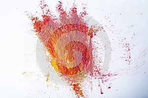 Colorful holi powder explosion on white background