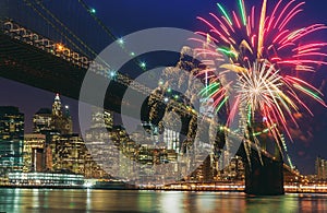 Colorful holiday fireworks panoramic view New York city Manhattan downtown skyline at night