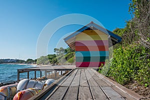 Colorful home and wooden walkway