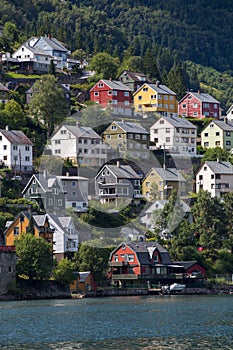 Colorful homes against a mountain in Norway
