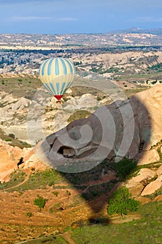 Colorful hot air balloon flies in Cappadocia region, Turkey