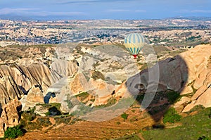 Colorful hot air balloon flies in Cappadocia region, Turkey