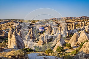 Colorful hot air balloon flying over Cappadocia, Turkey