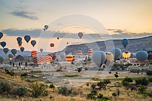 Colorful hot air balloon flying over Cappadocia, Turkey