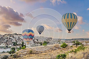 Colorful hot air balloon flying over Cappadocia, Turkey