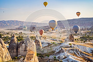 Colorful hot air balloon flying over Cappadocia, Turkey