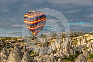 Colorful hot air balloon flying over the goreme valley