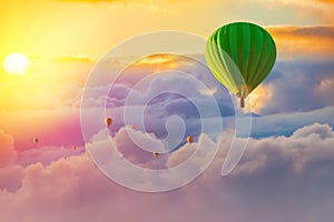 Colorful hot air balloons with cloudy sunrise background