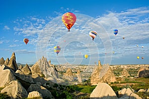 Colorful hot air balloons flying, Cappadocia, Anatolia, Turkey. photo