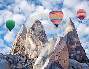 Colorful hot air balloons flying over Cappadocia, Turkey