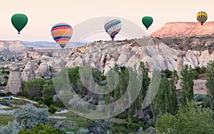 Colorful hot air balloons flying over Cappadocia, Turkey