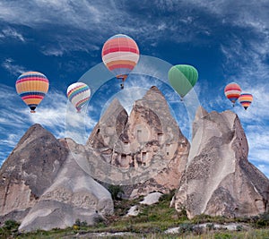 Colorful hot air balloons flying over Cappadocia, Turkey