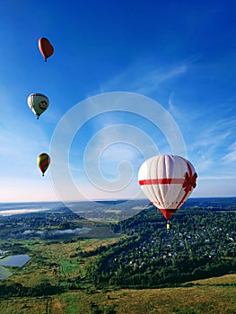 colorful hot air balloons over blue sky