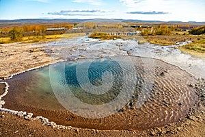 Colorful hot water pool in Iceland near Strokkur, the biggest geyser in Iceland