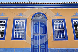 Colorful house facade with ornaments in historical town Sao Luiz do Paraitinga, Brazil