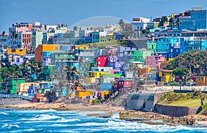 Colorful house line the ocean front in San Juan, Puerto Rico