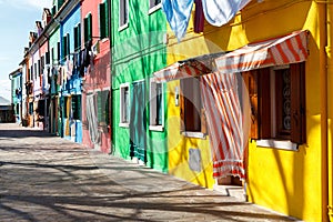 Colorful houses alongside the canal in Burano island