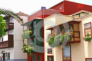 Colorful houses with blooming flowers in Santa Cruz, La Palma, Spain