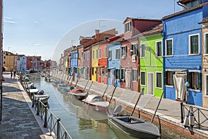 Colorful houses and canal on Burano island, near Venice, Italy.