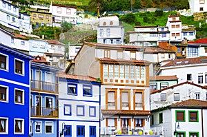 Colorful houses. Colorful windows and facades in Cudillero, Spain. Ancient facades photo