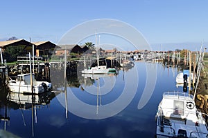 Colorful houses in the French fishing port Oyster farming harbour of Gujan Mestras in Arcachon bassin Gironde France