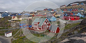 colorful houses in the hill in the fishing village, Qaqortoq, Greenland