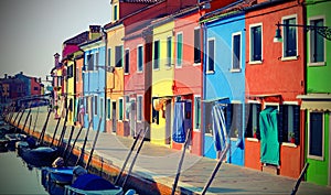 Colorful houses of the island of Burano with vintage old effect