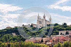 Colorful houses of Lyon and Fourviere Basilica from the Saone riverbank, France