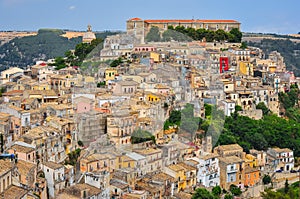 Colorful houses in old medieval village Ragusa in Sicily photo