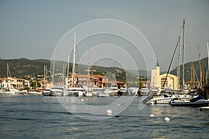 Colorful houses in Port Grimaud, village on Mediterranean sea with yacht harbour, Provence, France