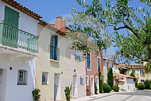 Colorful houses in Port Grimaud, village on Mediterranean sea with yacht harbour, Provence, summer vacation France