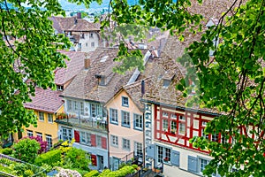 Colorful houses with red tile roofs in Rapperswil, Switlzerland.