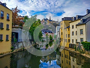 Colorful houses at the sides of the Alzette river in old town Grund district of Luxembourg City, Luxembourg, with beautiful