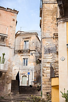 Colorful houses and streets in old medieval village Ragusa in Sicily, Italy.