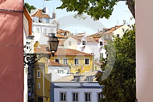 Colorful houses with tiled roofs in sunny Lisbon, Portugal